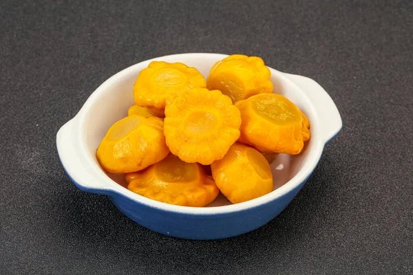 Vegetarian food - Marinated yellow patisson in the bowl