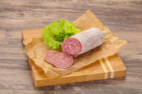 Italian Dry Saliami Pork Sausage Served Salad Leaves — Stock Photo, Image