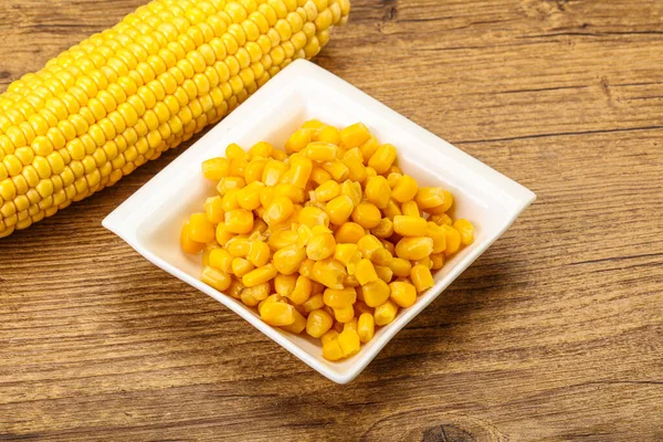 Sweet yellow corn grain in the bowl