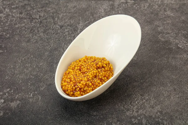 Dijon mustard sauce with seeds in the bowl