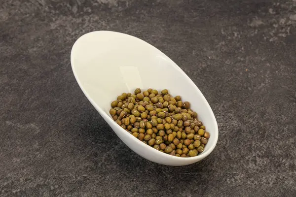Vegetarian cuisine - dry green lentil for cooking
