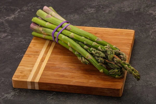 Vegan cuisine - Raw asparagus heap  for cooking