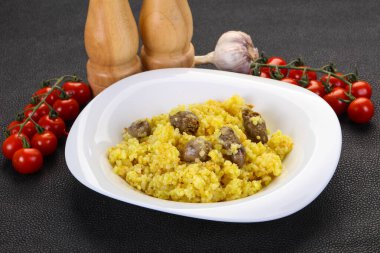 Tavuk kalbi ve baharatlı pilav.