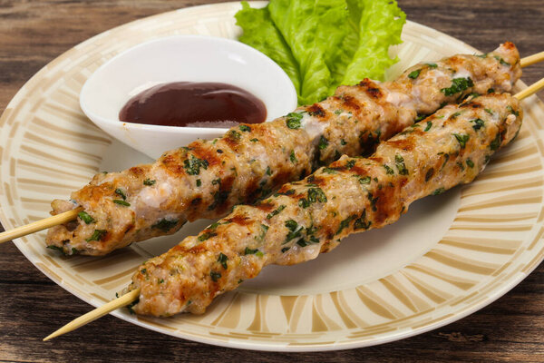 Minced pork skewer kebab with bbq sauce