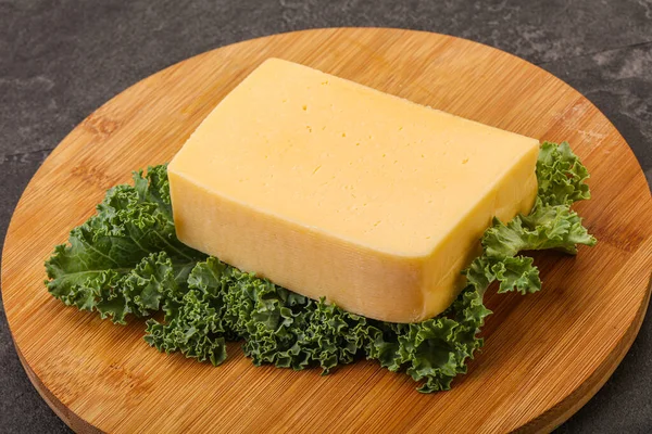 Tasty Yelloow Tilsiter Cheese Brick Board — Stock Photo, Image