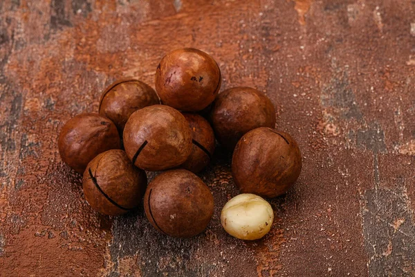 Brown Primo Piano Mucchio Noci Macadamia Sfondo — Foto Stock