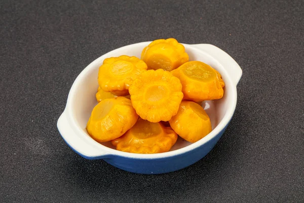 Vegetarian food - Marinated yellow patisson in the bowl