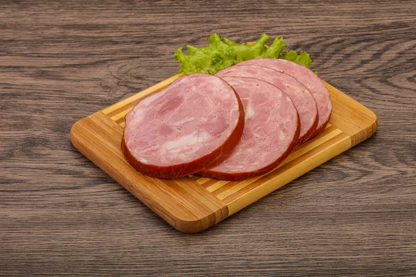 Scheiben Schweinefleischschinken Über Holzbrett — Stockfoto