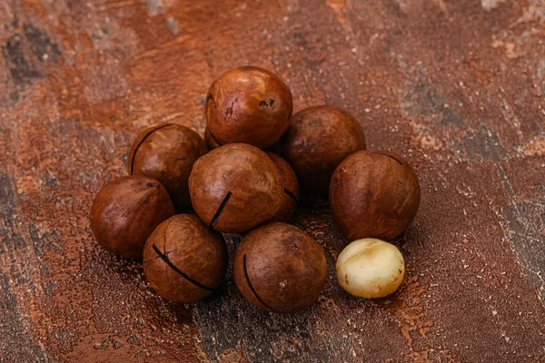 Kahverengi Yakın Plan Macadamia Ceviz Yığını — Stok fotoğraf