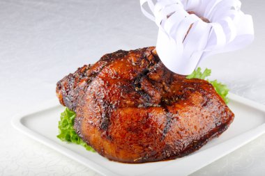 Baked Pork leg on table