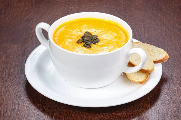 Tasty Pumpkin Soup Seeds Served Bread — Stock Photo, Image