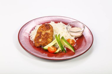 Tavuk pirzolası ve sebzeli pilav.