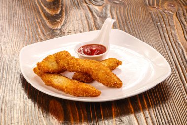 Domates soslu kızarmış tavuk şeritleri