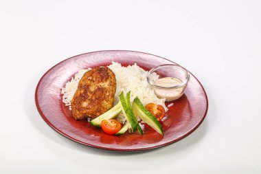 Tavuk pirzolası ve sebzeli pilav.