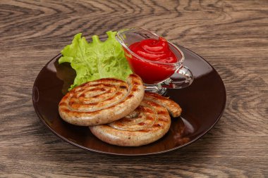 Izgara domuz eti soslu leziz sosis.