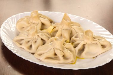 Georgian traditional cuisine - juicy Khinkali with meat