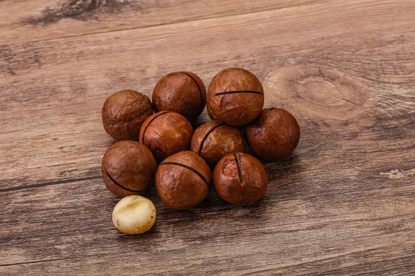 Brown Primo Piano Mucchio Noci Macadamia Sfondo — Foto Stock