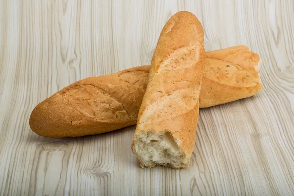 Broken fresh loaf bread — Stock Photo, Image