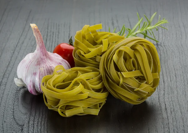 Raw tagliatelle — Stock Photo, Image