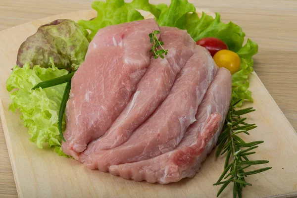 Raw pork schnitzel — Stock Photo, Image