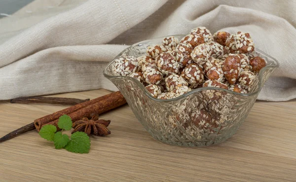 Peanut in honey with sesame seeds — Stock Photo, Image