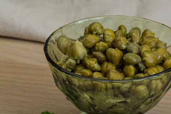 Capers in the bowl — Stock Photo, Image