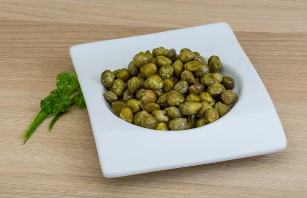 Capers in the bowl — Stock Photo, Image