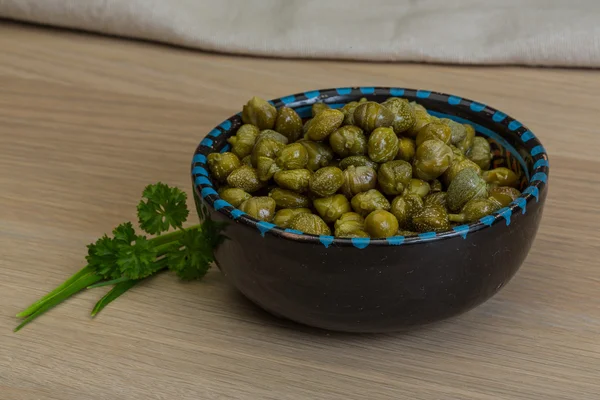 Capers in the bowl — Stock Photo, Image