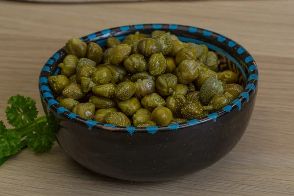 Capers in the bowl — Stock Photo, Image