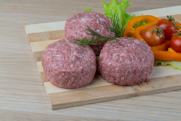 Raw burger cutlet — Stock Photo, Image