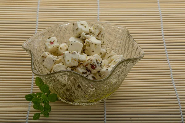 Cheese with spices and oil — Stock Photo, Image