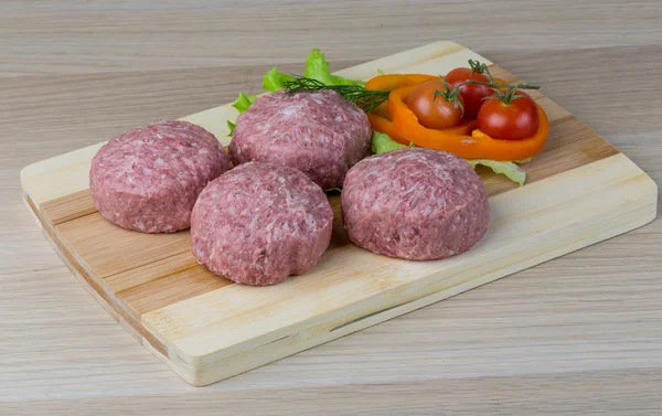 Raw burger cutlet — Stock Photo, Image