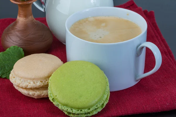 Coffee with macaroons and milk