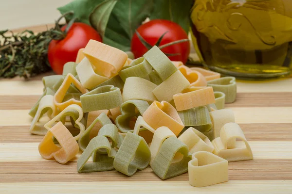 Raw heart-shaped pasta — Stock Photo, Image