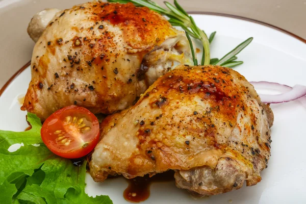 Roasted chicken thighs — Stock Photo, Image