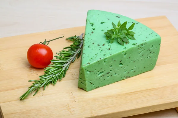 Green pesto cheese and basil leaves — Stock Photo, Image