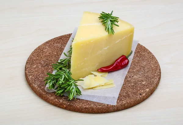 Parmesan cheese with rosemary — Stock Photo, Image