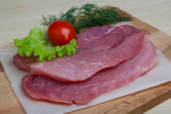 Raw pork schnitzel — Stock Photo, Image