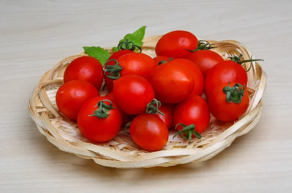Cherry tomatoes in the basket — Stock Photo, Image