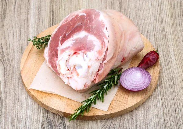 Raw pork knuckle  with rosemary — Stock Photo, Image