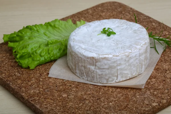 Camembert cheese with herbs — Stock Photo, Image