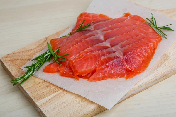 Salmon sashimi with rosemary — Stock Photo, Image