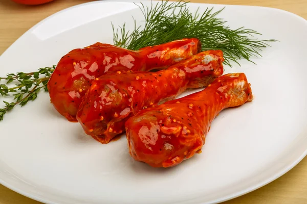 Chicken legs in red tomato sauce — Stock Photo, Image