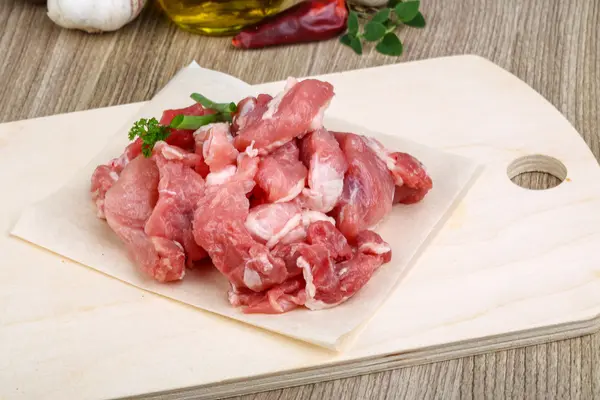Raw pork meat pieces — Stock Photo, Image