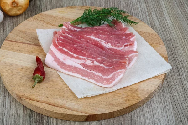 Raw bacon strips — Stock Photo, Image