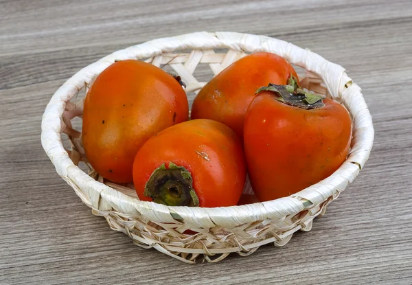 Ripe juicy Persimmon fruits — Stock Photo, Image