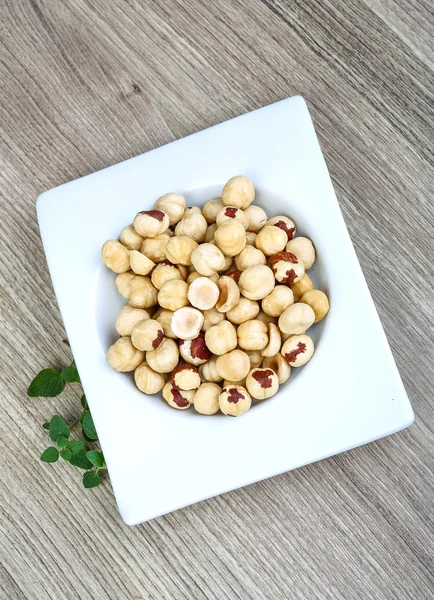 Hazelnuts in the bowl — Stock Photo, Image