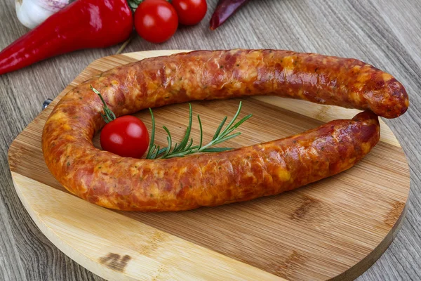 Sausage ring with rosemary — Stock Photo, Image