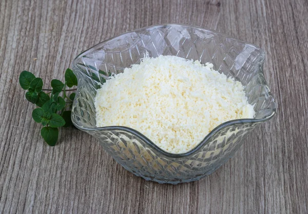 Shredded parmesan  in bowl — Stock Photo, Image