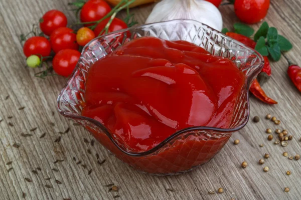 Tomato ketchup with herbs — Stock Photo, Image